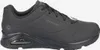 A black Skechers sneaker is shown from the side against a white background. Voir les images du produit