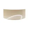 A curved reception desk with a decorative element and internal lighting. Produktbild-Vorschau