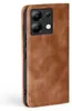 A brown leather flip case for a smartphone is shown from the side. Produktbild-Vorschau