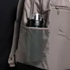 Close-up of a backpack side pocket with a water bottle inside. Anteprima dell’immagine prodotto
