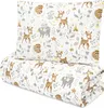 A folded baby duvet and pillow with a woodland animal print. Produktbild-Vorschau