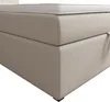 A close-up view of a beige upholstered bed base with a white mattress topper. Voir les images du produit