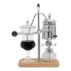 A siphon coffee maker on a wooden base against a white background. Náhled obrázku produktu