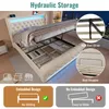 A bed with its storage compartment open, showing organized storage solutions and highlighting features like hydraulic lift and bed stoppers. Anteprima dell’immagine prodotto