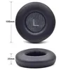 Two views of a black headphone earpad, with dimensions indicated. Produktbild-Vorschau