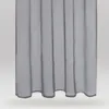 A close-up of a gray, sheer curtain with vertical pleats. Anteprima dell’immagine prodotto