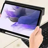 A person is holding a tablet with a keyboard case attached, displaying a colorful wallpaper. Podgląd zdjęcia produktu