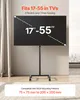 A black rolling TV stand holding a large flat-screen TV, with text overlays highlighting features. Voir les images du produit