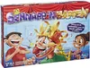 The image shows the box art for the board game "Schnapp 'n Happen". It features cartoon characters and game elements. Anteprima dell’immagine prodotto