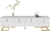 A white TV stand with gold accents and decorative vases and a plant on top, set against a white background. Produktbild-Vorschau