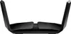 A black Netgear Nighthawk wireless router with its antennas extended, shown from a front-facing, slightly elevated angle against a white background. Podgląd zdjęcia produktu