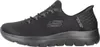 A side view of a black Skechers slip-on shoe. Voir les images du produit