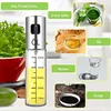 A marketing image showcasing an oil sprayer with various liquids and ingredients around it. Produktbild-Vorschau