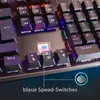 A close-up view of a mechanical keyboard with illuminated keys and a detailed inset of a blue switch. Produktbild-Vorschau