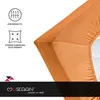 A close-up of an orange fitted sheet on a mattress, with icons and text describing product features on the left. Produktbild-Vorschau