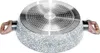 The underside of a cooking pot with a speckled gray exterior and a metallic base with a pattern of dots. Náhľad obrázku produktu