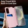 A hand holding a pink flip case for a smartphone, with a card inserted into a slot. Náhled obrázku produktu