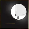 A close-up view of the bottom part of a white cabinet with a drawer and black legs, presented within a white circle against a black background. Voir les images du produit
