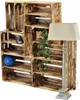 A set of wooden crates arranged as shelving, with a lamp and decorative items. Anteprima dell’immagine prodotto