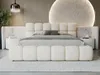 A modern bedroom with a large, upholstered bed as the focal point. Produktbild-Vorschau