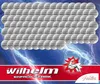 A large collection of CR2450 batteries are displayed against a blue, lightning-themed background. The bottom of the image features a red banner with the brand name 'wilhelm' and the slogan 'EINFACH STARK'. Produktbild-Vorschau