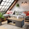 A cozy living room setup with a pallet couch and a modern coffee table. Voir les images du produit