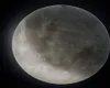 A close-up view of the moon against a black background. Náhled obrázku produktu