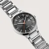 A close-up shot of a Bering men's watch with a gray dial and silver metal band, set against a light gray background. Náhled obrázku produktu