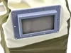 A close-up view of a sandblasting hood, focusing on the mesh window and its surrounding frame. Náhled obrázku produktu