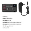 A black PD+USB charger with multiple ports and a digital display, shown next to its power adapter. Podgląd zdjęcia produktu