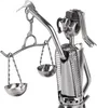 A close-up of a metal figurine of Justitia, the Roman goddess of justice, holding scales. Náhľad obrázku produktu