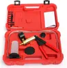 A red plastic case containing a vacuum pump kit for automotive use. Anteprima dell’immagine prodotto