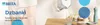 A Brita water filter pitcher is pouring water into glasses on a wooden table, with a pepper mill and other kitchen items in the background. Text and branding are visible on the left side. Produktbild-Vorschau