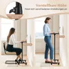 A split image showing a woman sitting at a rolling table and another woman standing at a rolling table, demonstrating adjustable height. Podgląd zdjęcia produktu