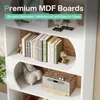 A bookshelf with books and decorative items. Produktbild-Vorschau