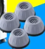 Four gray anti-vibration pads for appliance feet are arranged in a cluster against a yellow and blue background. Náhled obrázku produktu