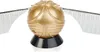 A golden snitch with white wings on a black stand, isolated on a white background. Produktbild-Vorschau
