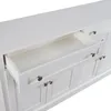 A close-up view of a white sideboard with one drawer pulled out. Produktbild-Vorschau