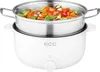 A white electric pot with a steaming basket filled with chopped vegetables. Produktbild-Vorschau
