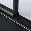 A close-up view of the bottom corner of a shower enclosure, showing the track and frame. Produktbild-Vorschau