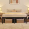 A bed frame with bedding and storage baskets underneath, in a bedroom setting. Produktbild-Vorschau