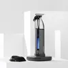 A BaByliss trimmer is displayed on a charging stand against a white background. Anteprima dell’immagine prodotto