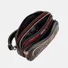 A top-down view of an open handbag against a plain background. Anteprima dell’immagine prodotto