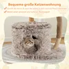 A cat is inside a plush cat house on a cat tree. Produktbild-Vorschau