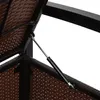 Close-up of a gas strut mechanism on a brown rattan storage bench. Podgląd zdjęcia produktu