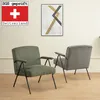 Two armchairs are placed in a room with a painting on the wall and a Swiss flag logo. Produktbild-Vorschau