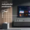 A modern living room setup with a TV displaying streaming content, a media console, and decorative items. Náhled obrázku produktu