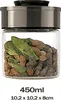 A glass storage jar filled with dried herbs and spices, with a metallic lid. Produktbild-Vorschau
