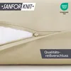 A close-up view of a beige pillowcase with a zipper, showing the texture of the fabric and some branding information. Anteprima dell’immagine prodotto
