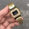 A hand holding a gold Casio watch. Podgląd zdjęcia produktu